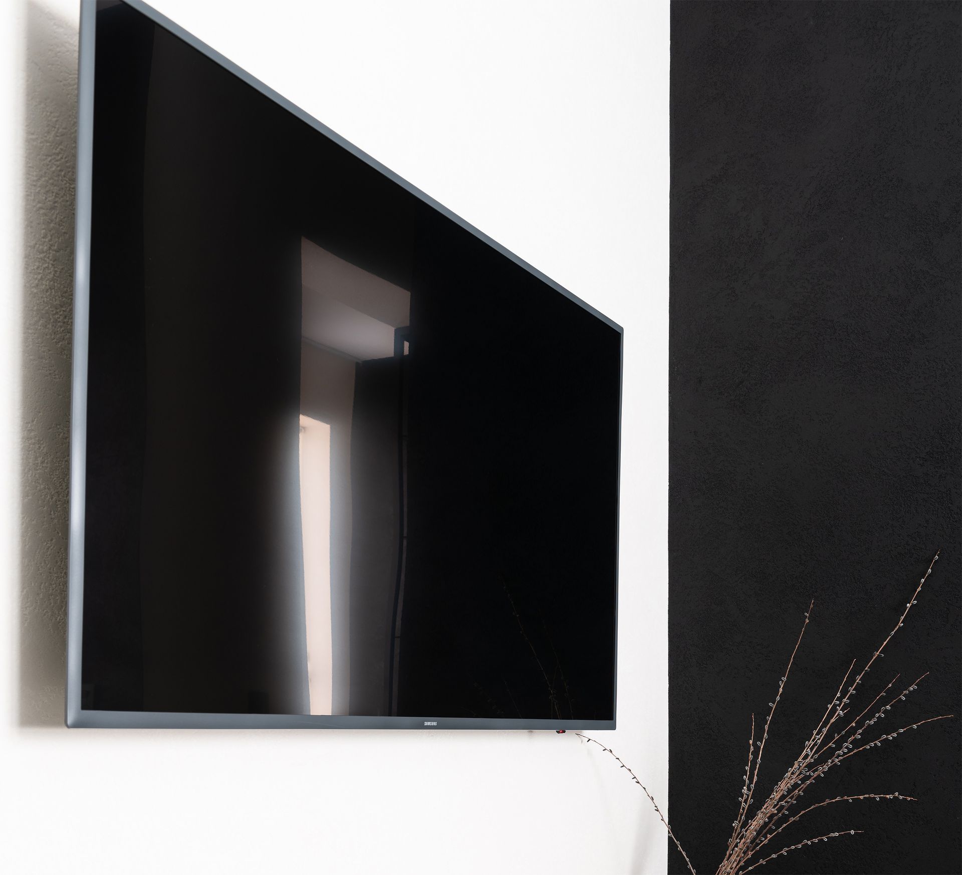 modern tv set hanging on wall