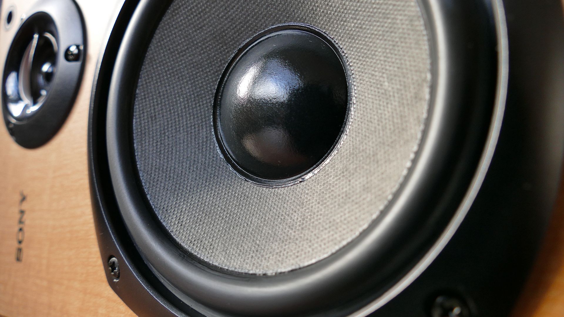 brown wooden framed sony speaker