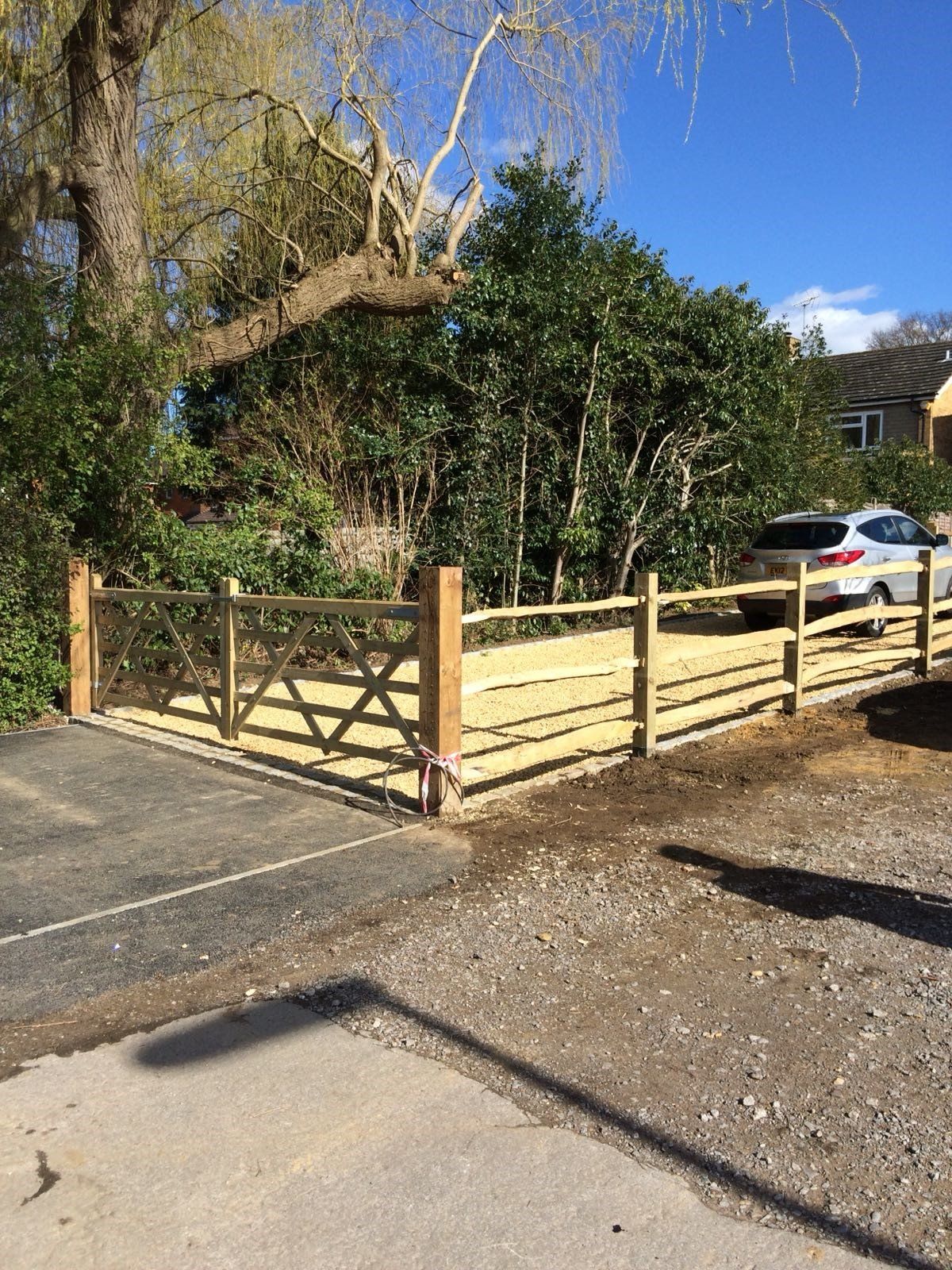wooden rail fencing with wooden gates