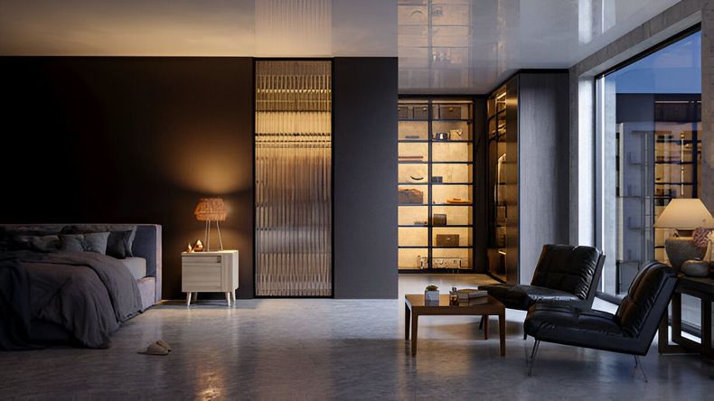 Luxurious bedroom: dark walls, lit wardrobe, bed, seating area with two chairs.