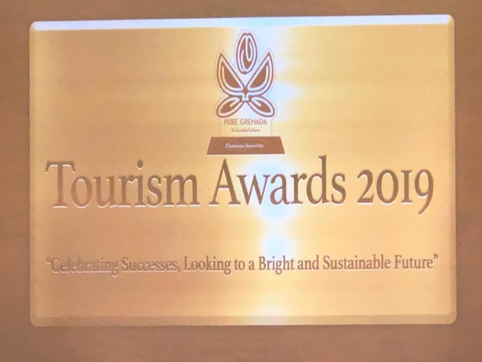 A sign that says tourism awards 2019 celebrating successes looking to a bright and sustainable future
