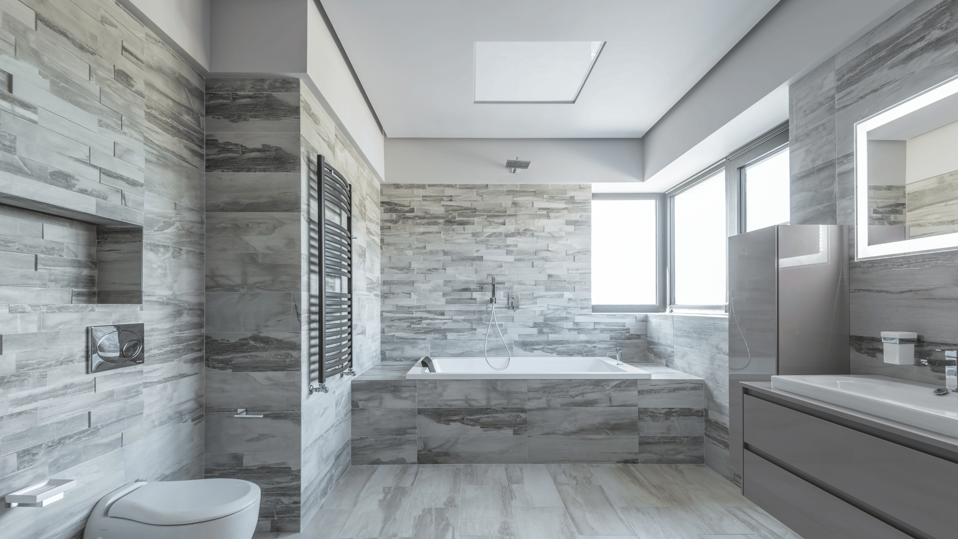 Bathroom with gray tiles
