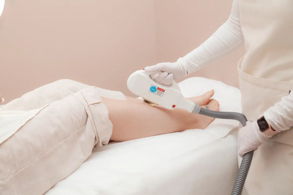 Person Receiving Laser Hair Removal on Leg in a Salon — Eternal Radiance in Strathmore, VIC