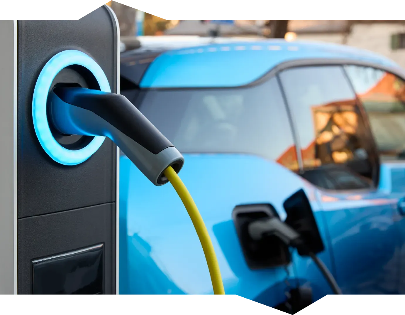 A person is opening a car door with a key.