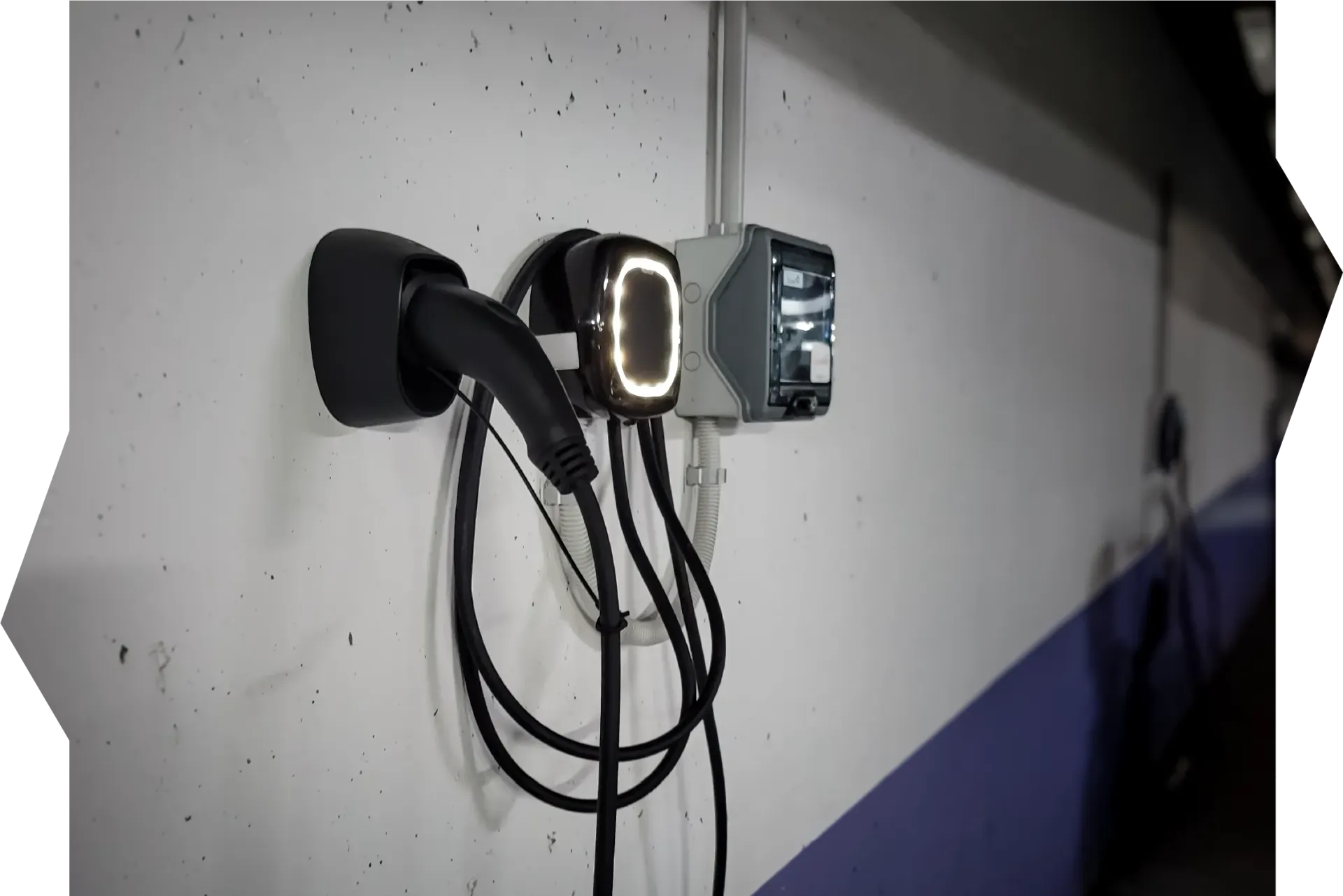 A person is fixing a car door lock with a screwdriver.