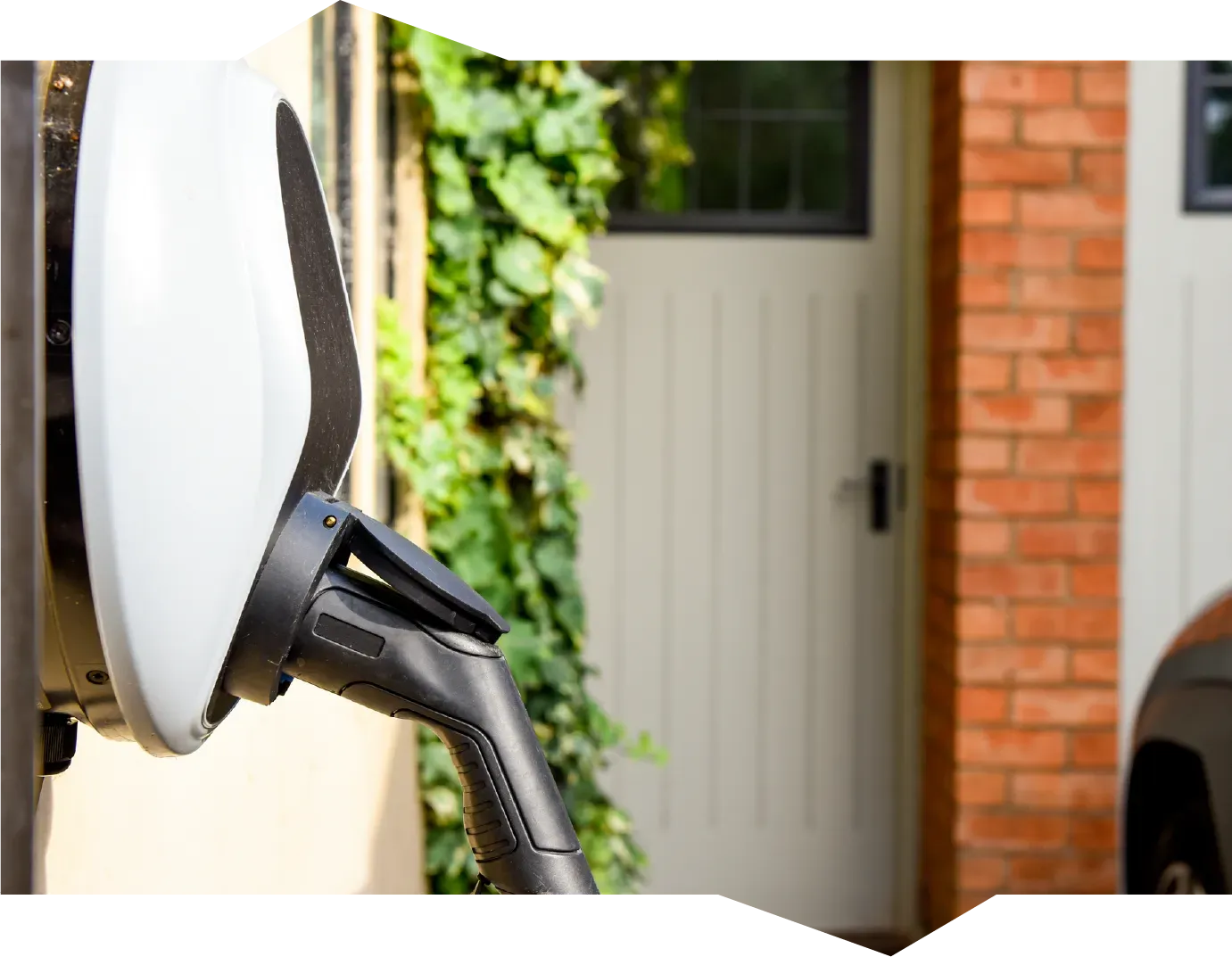 A person is opening a car door with a key.