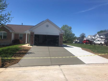 Concrete Driveway Installation — Newly Installed Driveway in St. Louis, MO