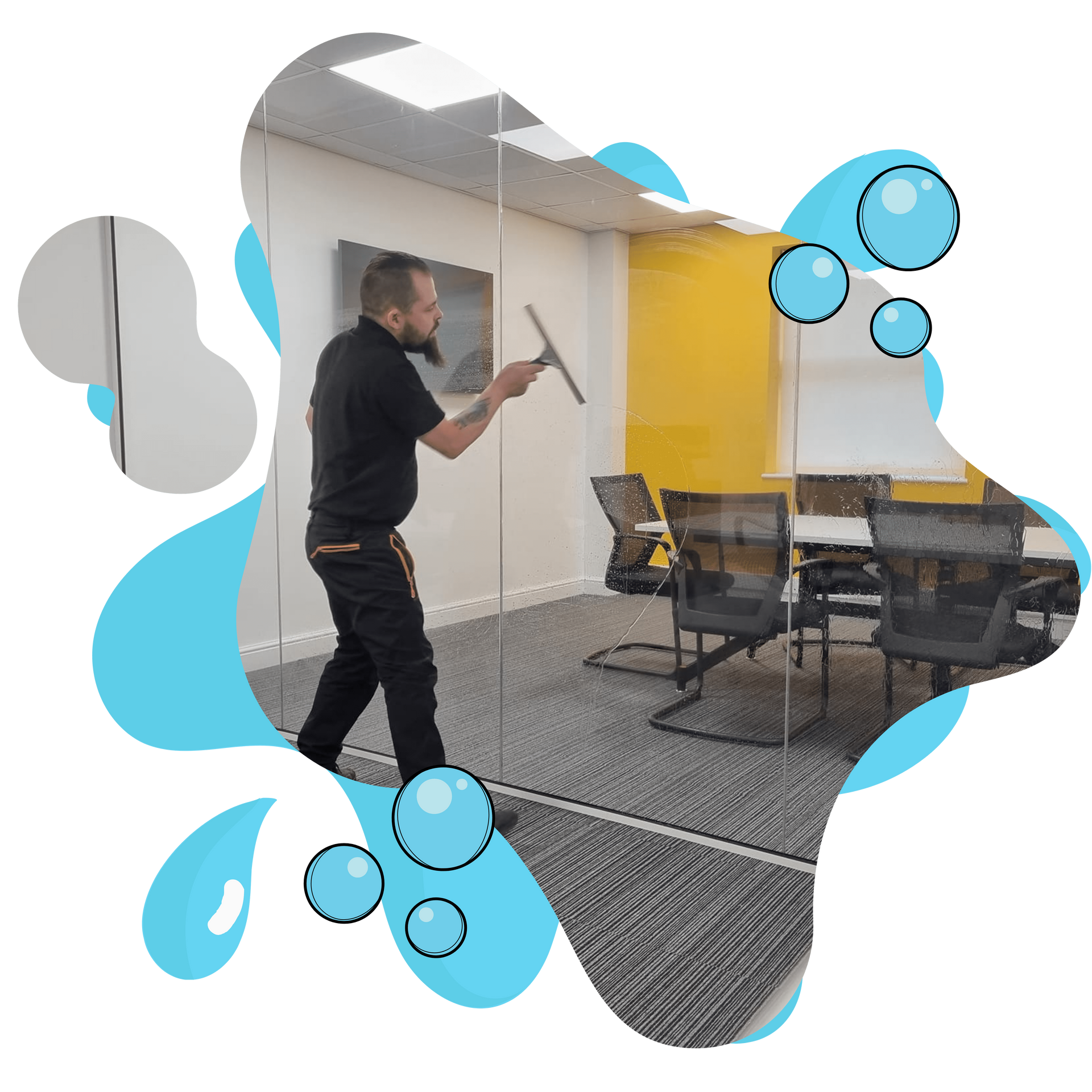 A man is cleaning a glass wall in a conference room.