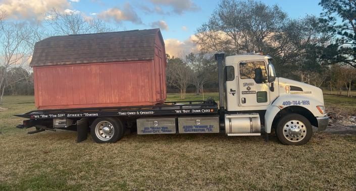 shed on tow truck