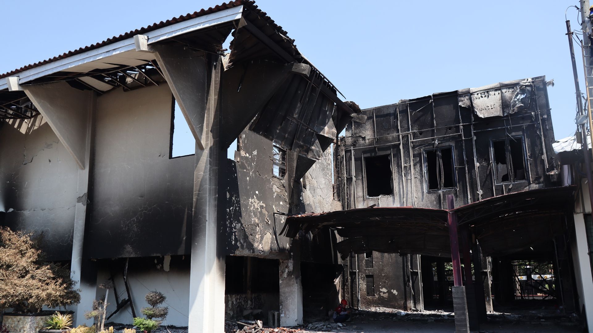 An aerial view of a residential area that has been damaged by a tornado.