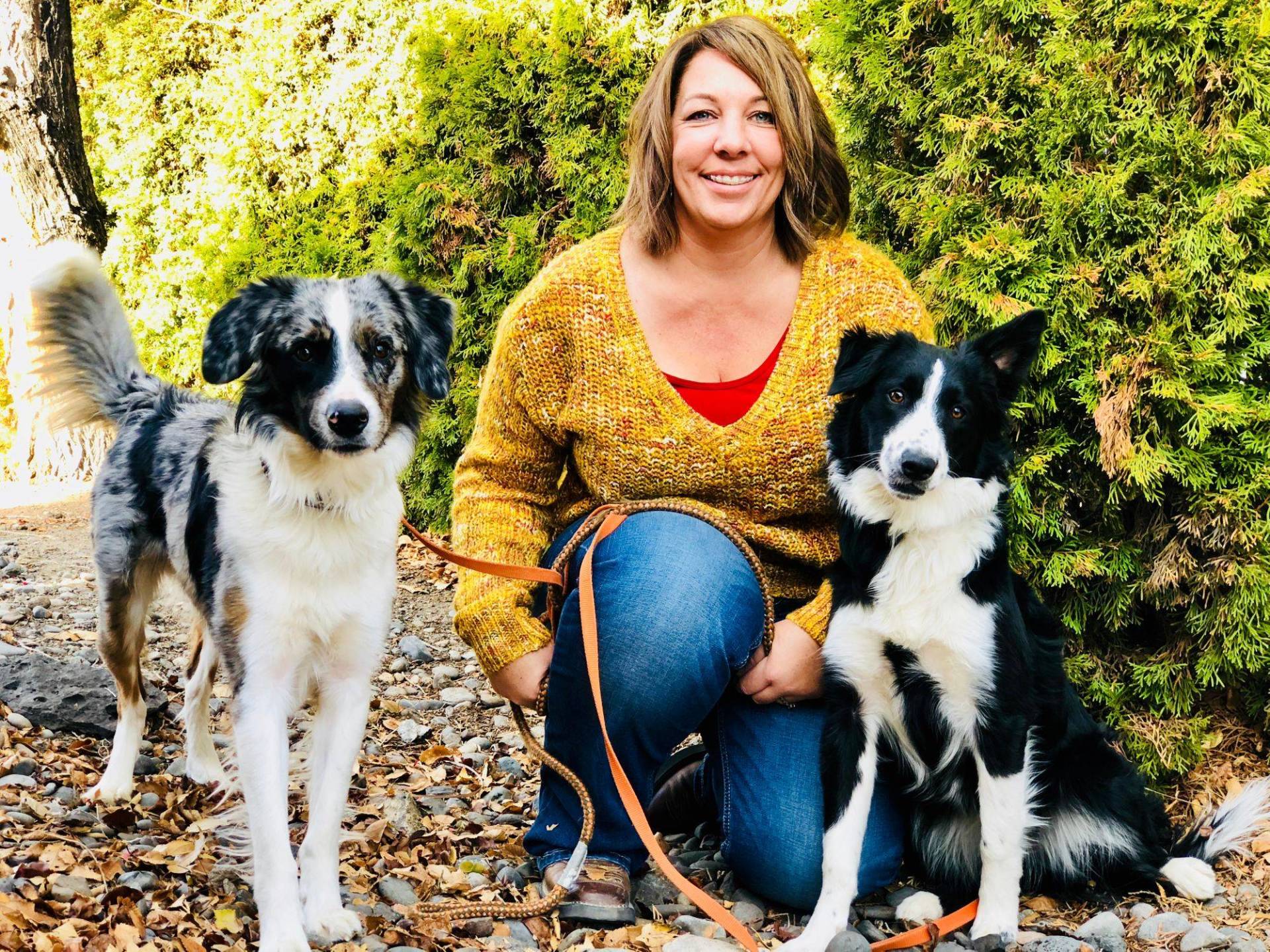 Woman with Two Dogs — Redmond, OR — Rimrock Veterinary Clinic​​