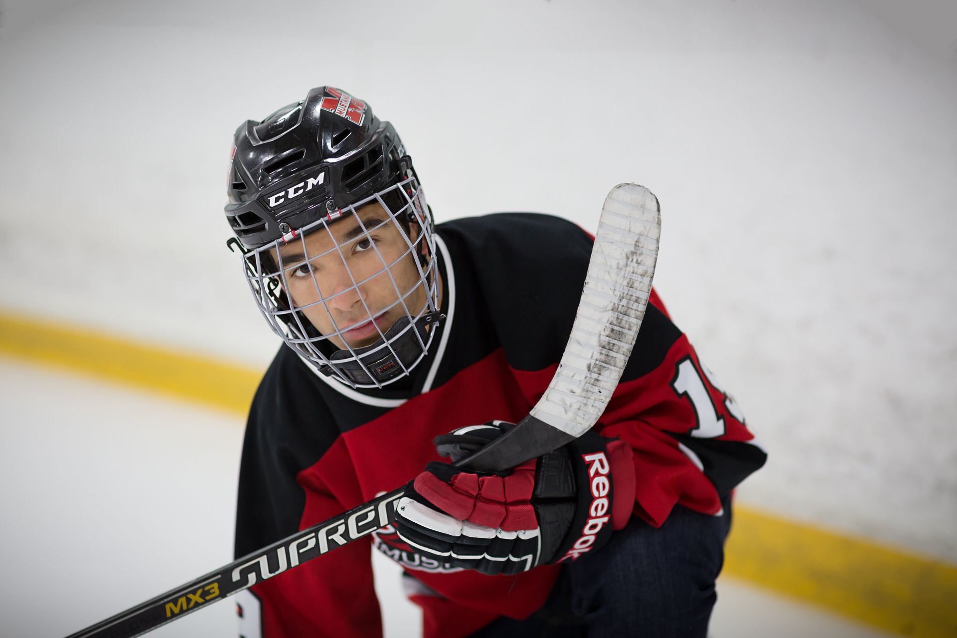A hockey player with the number 1 on his jersey