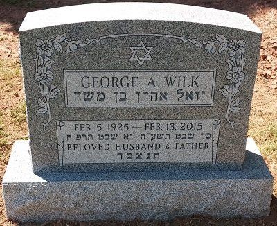 Headstone of George A. Wilk with Hebrew and English text, dates, and a Star of David.