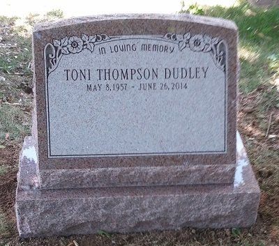 Gravestone of Toni Thompson Dudley, inscribed with name and dates, 