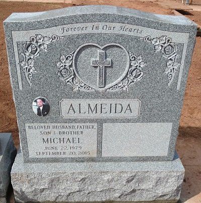 Gray granite tombstone with 