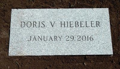 Tombstone of Doris V. Hiebeler, with the date January 29, 2016, set in the ground.