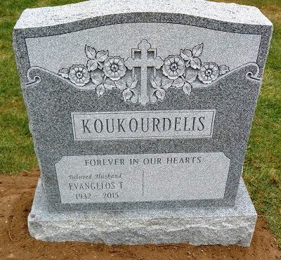 Gray granite headstone with 