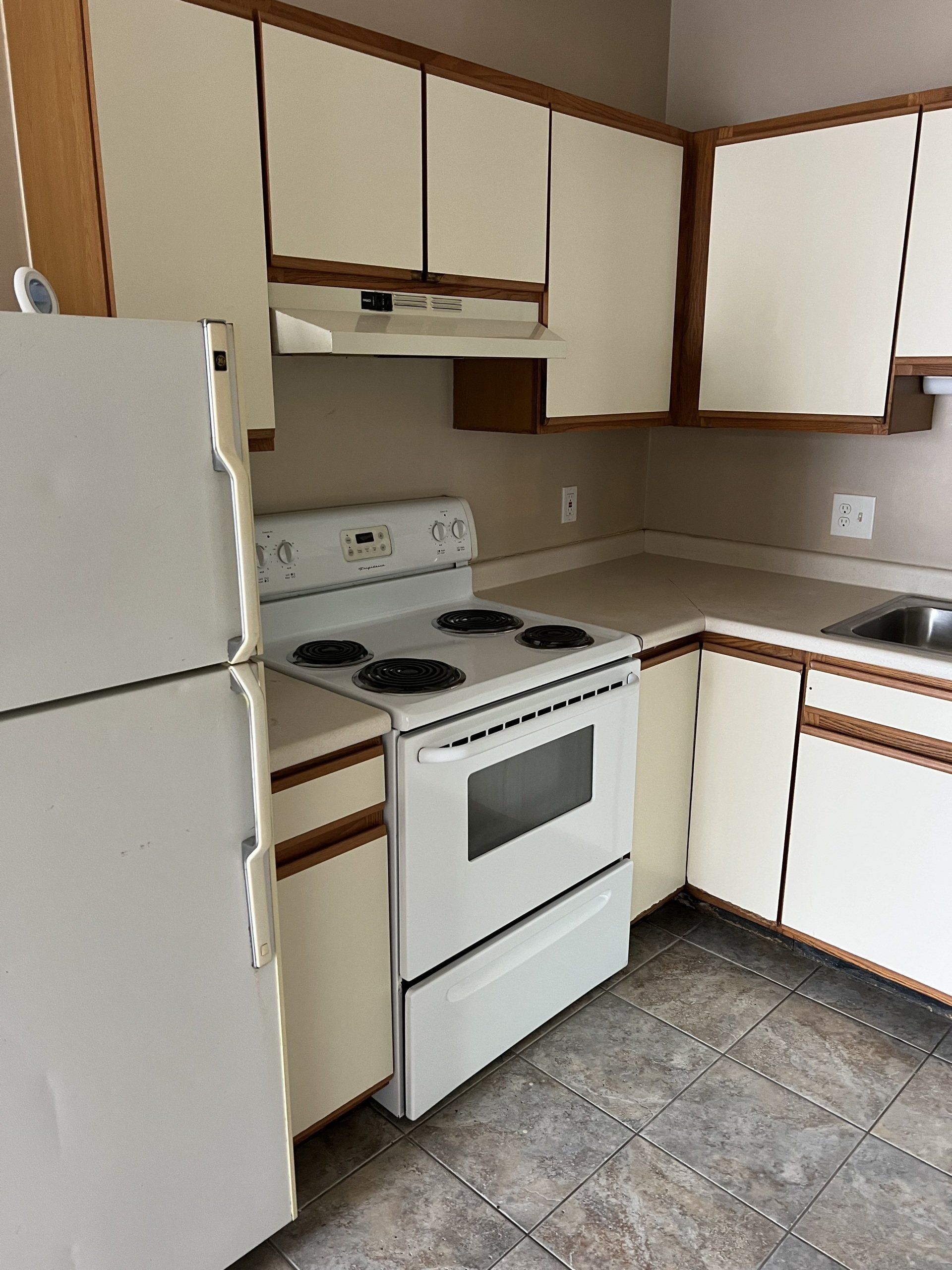 8 Church St. - Kitchen with stove and refrigerator