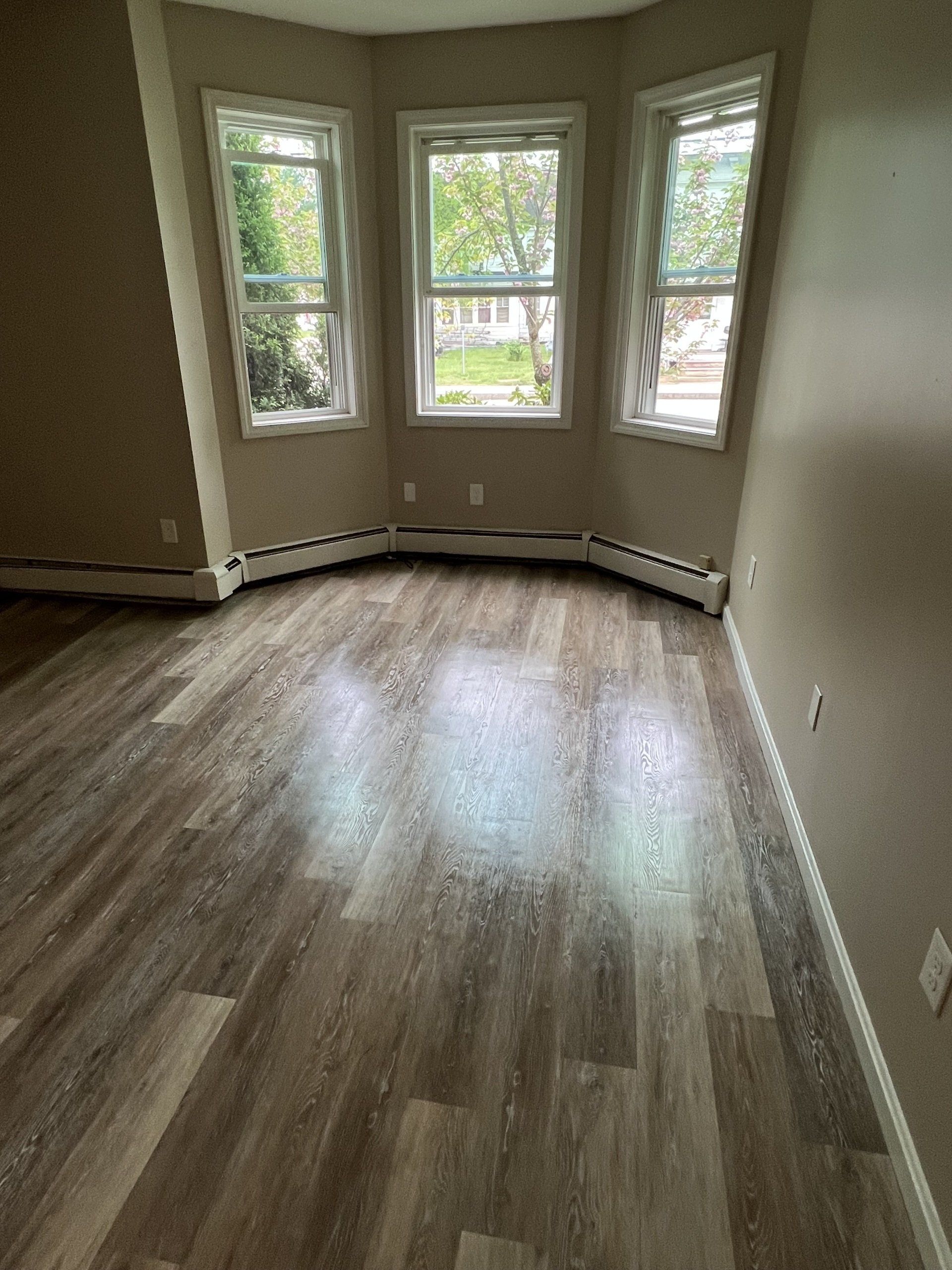 8 Church St. - Living room with large windows