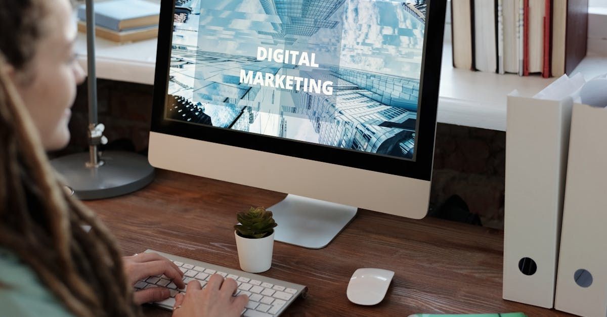 A man is pointing at a computer screen that says eve board