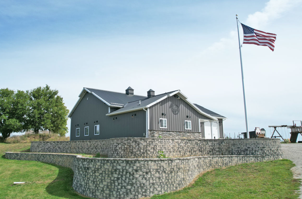 A house with a flag flying in front of it