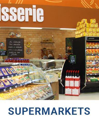 A supermarket with a sign that says ' tisserie supermarkets '