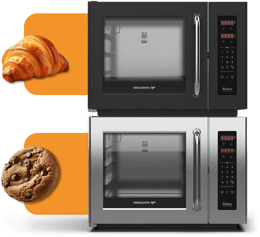 A croissant and a cookie are on top of a microwave oven