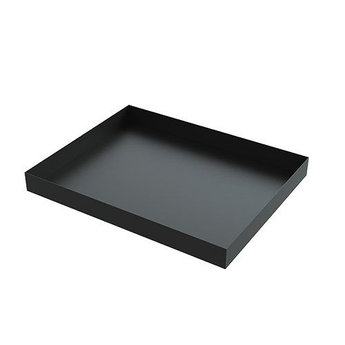 A black tray is sitting on a white surface.