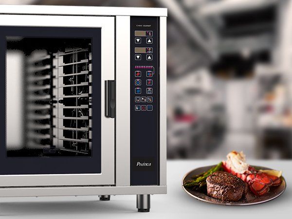 A microwave oven with a plate of food in front of it