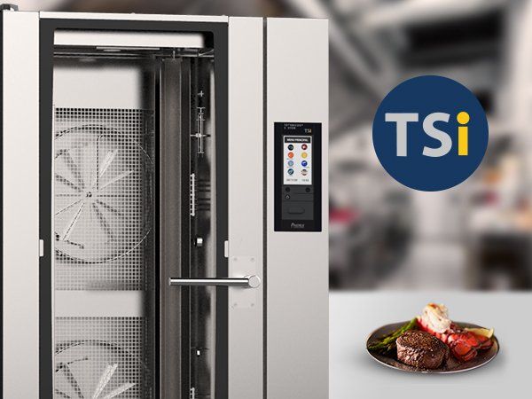 A plate of food is in front of a tsi logo