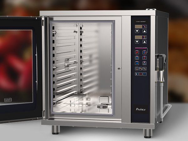 A stainless steel convection oven with the door open.