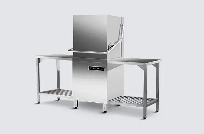 A stainless steel dishwasher is sitting on top of a stainless steel table.