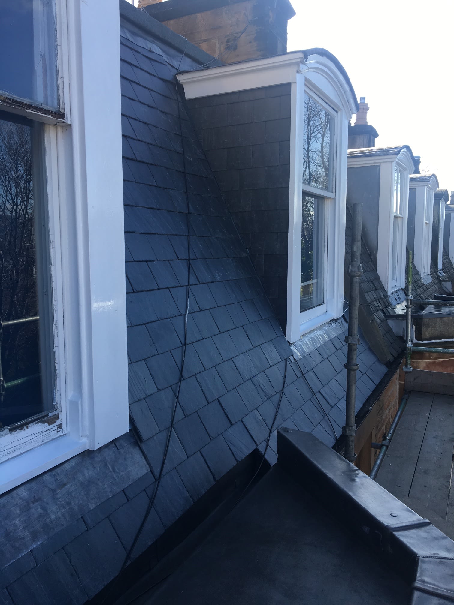 Slate roof with dormer windows