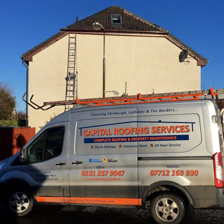 Capital Roofing Services van passenger side