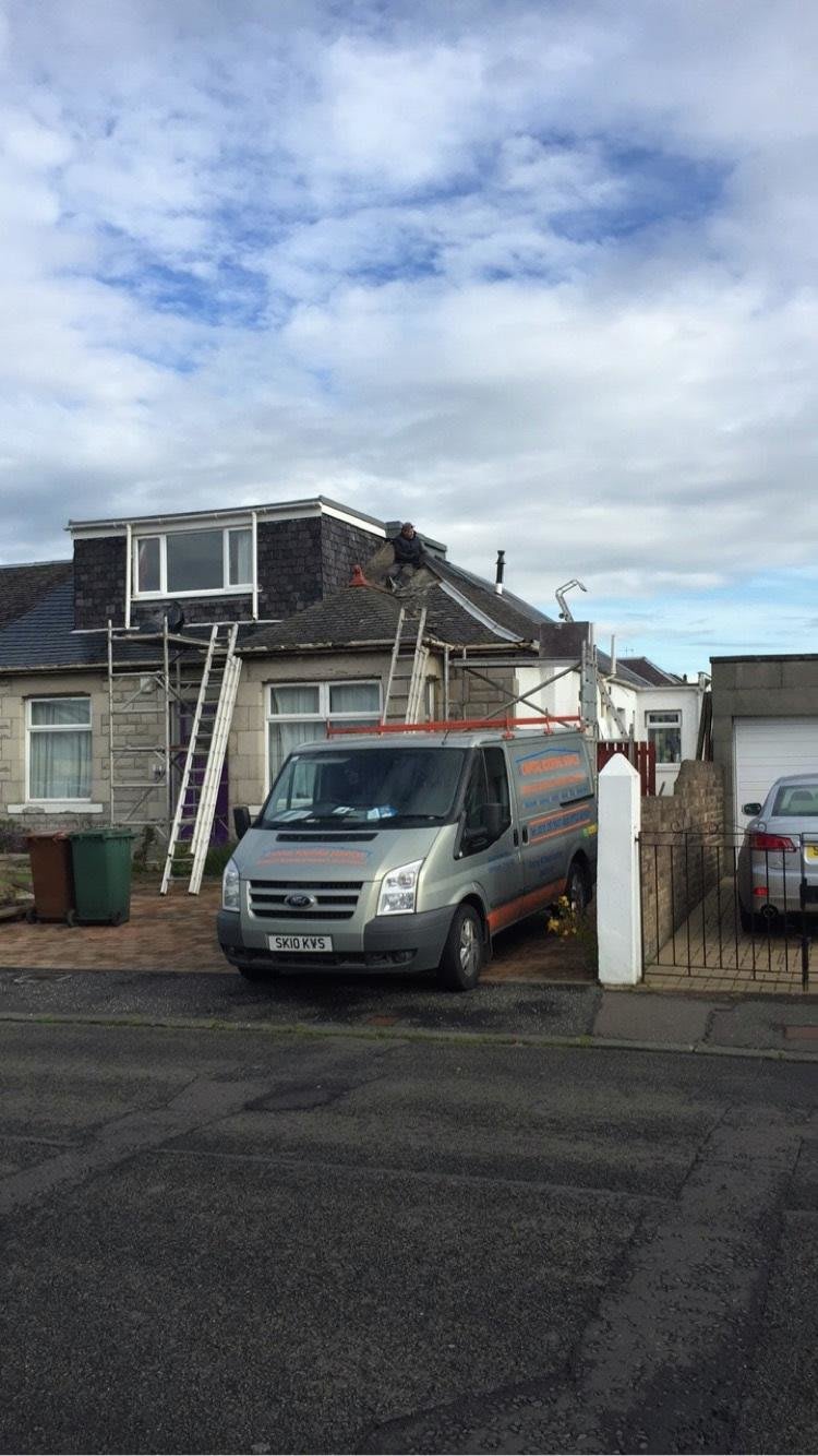 Front shot of the Capital Roofing services van