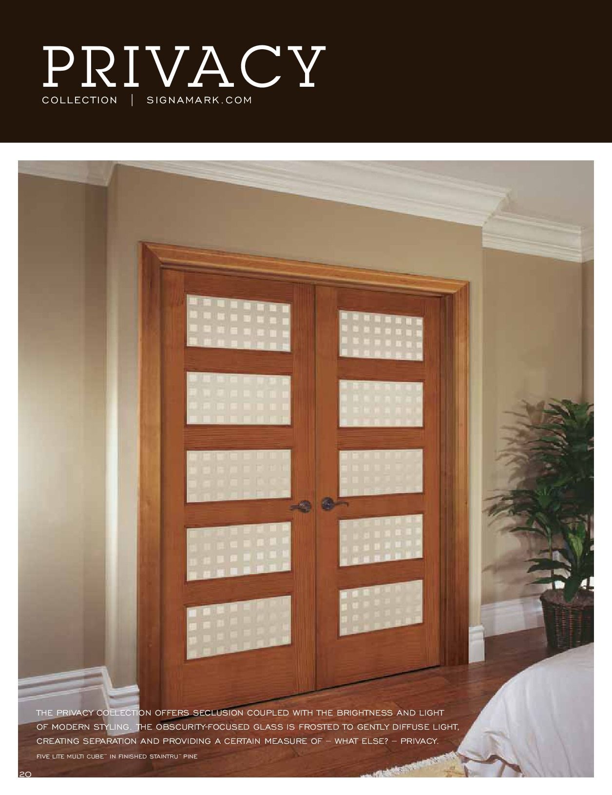 Double wooden doors with rectangular frosted glass panels; room interior.