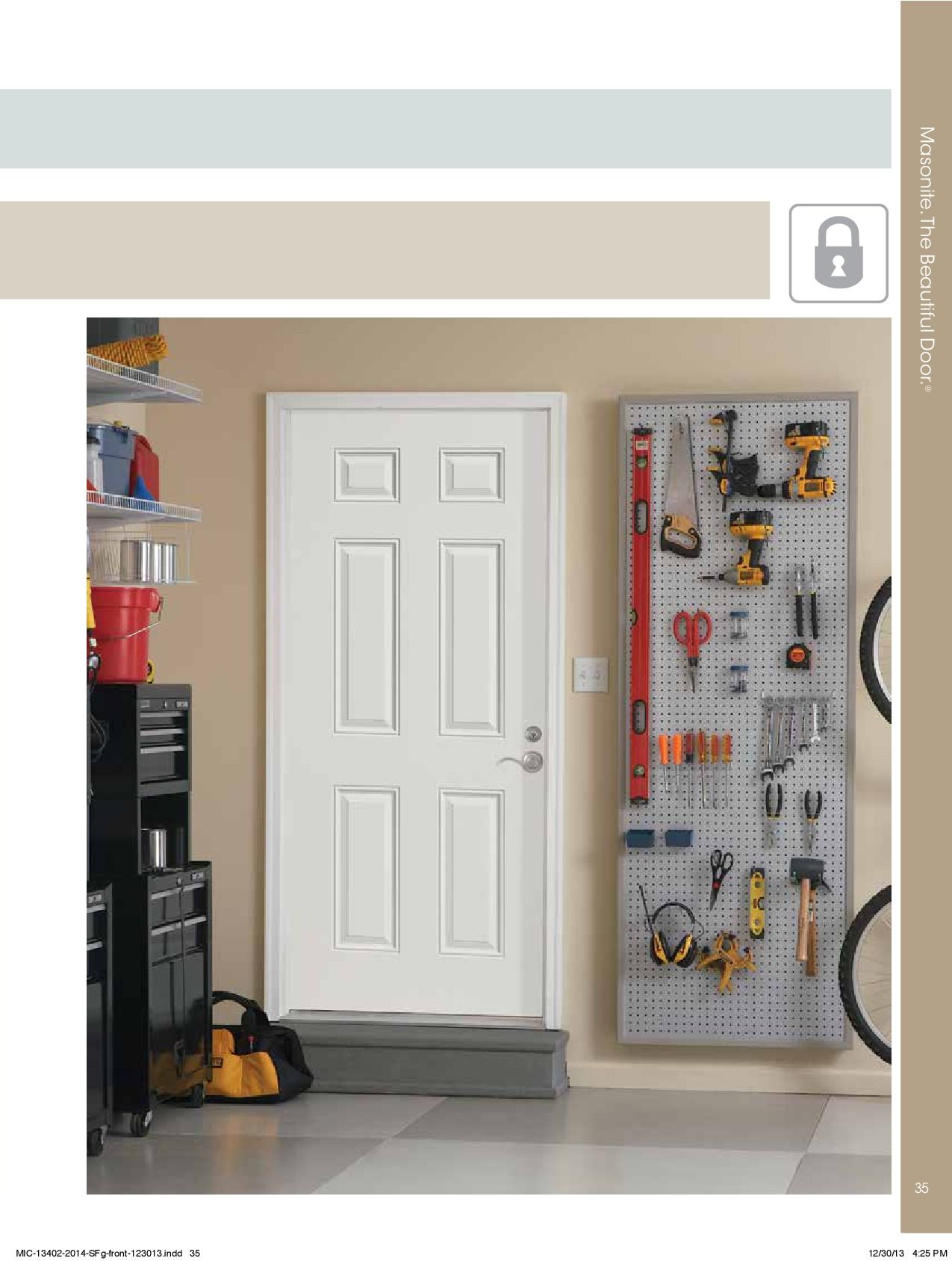 Garage interior with white door, tool board, and organized tools.