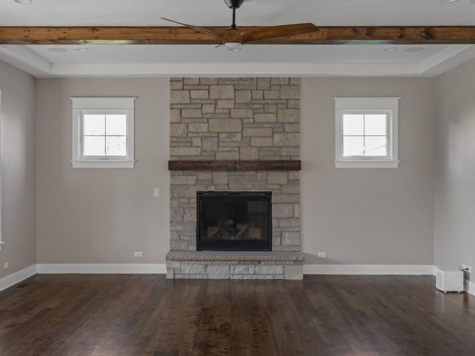 There is a fireplace in the middle of the room.