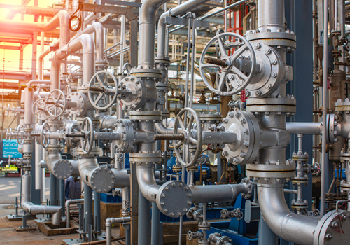 Industrial piping system in a petrochemical processing facility.