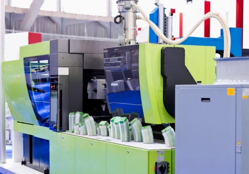 Close-up of a precision tool assembling a semiconductor circuit board.

