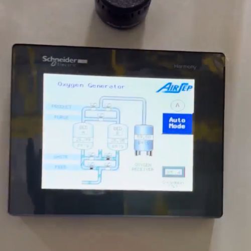 A schneider monitor shows a diagram of an oxygen generator