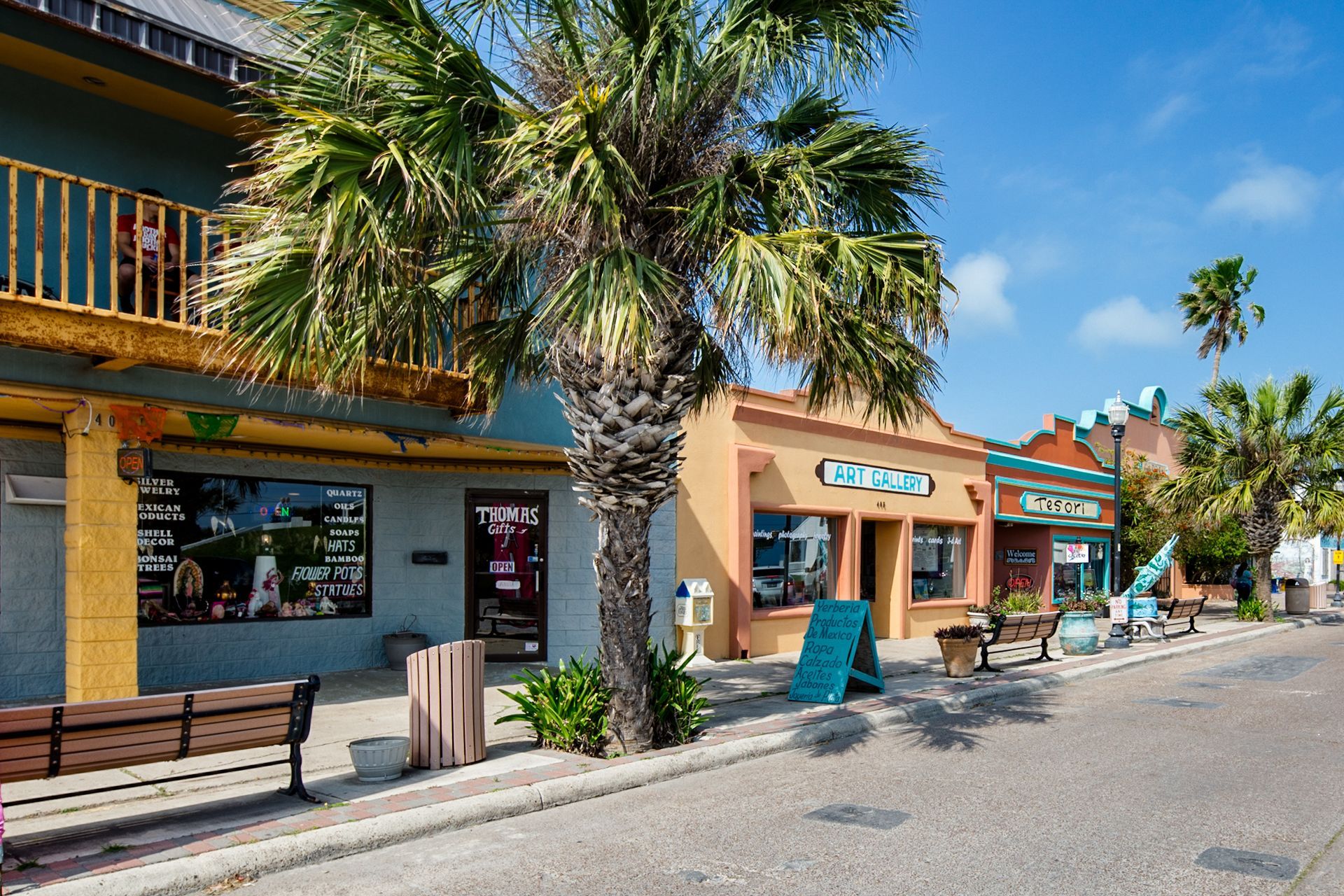 A row of colorful buildings on a sunny day