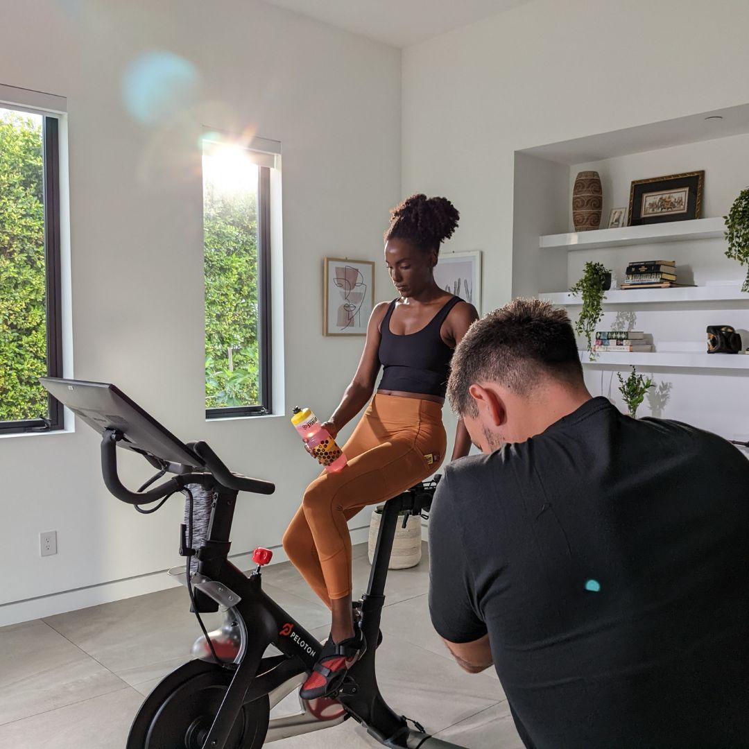 filming woman using workout products and equipment