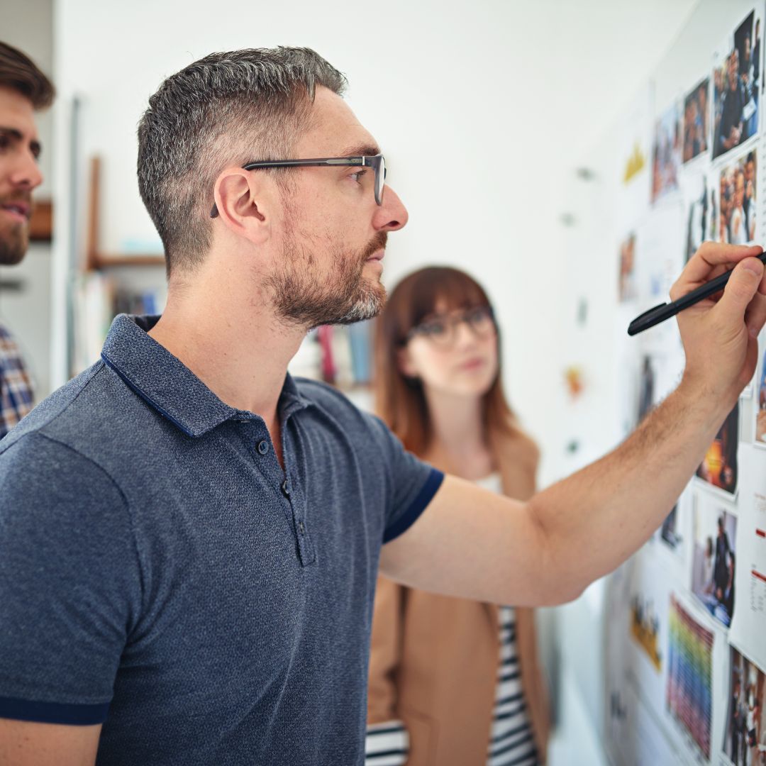 man storyboarding a video