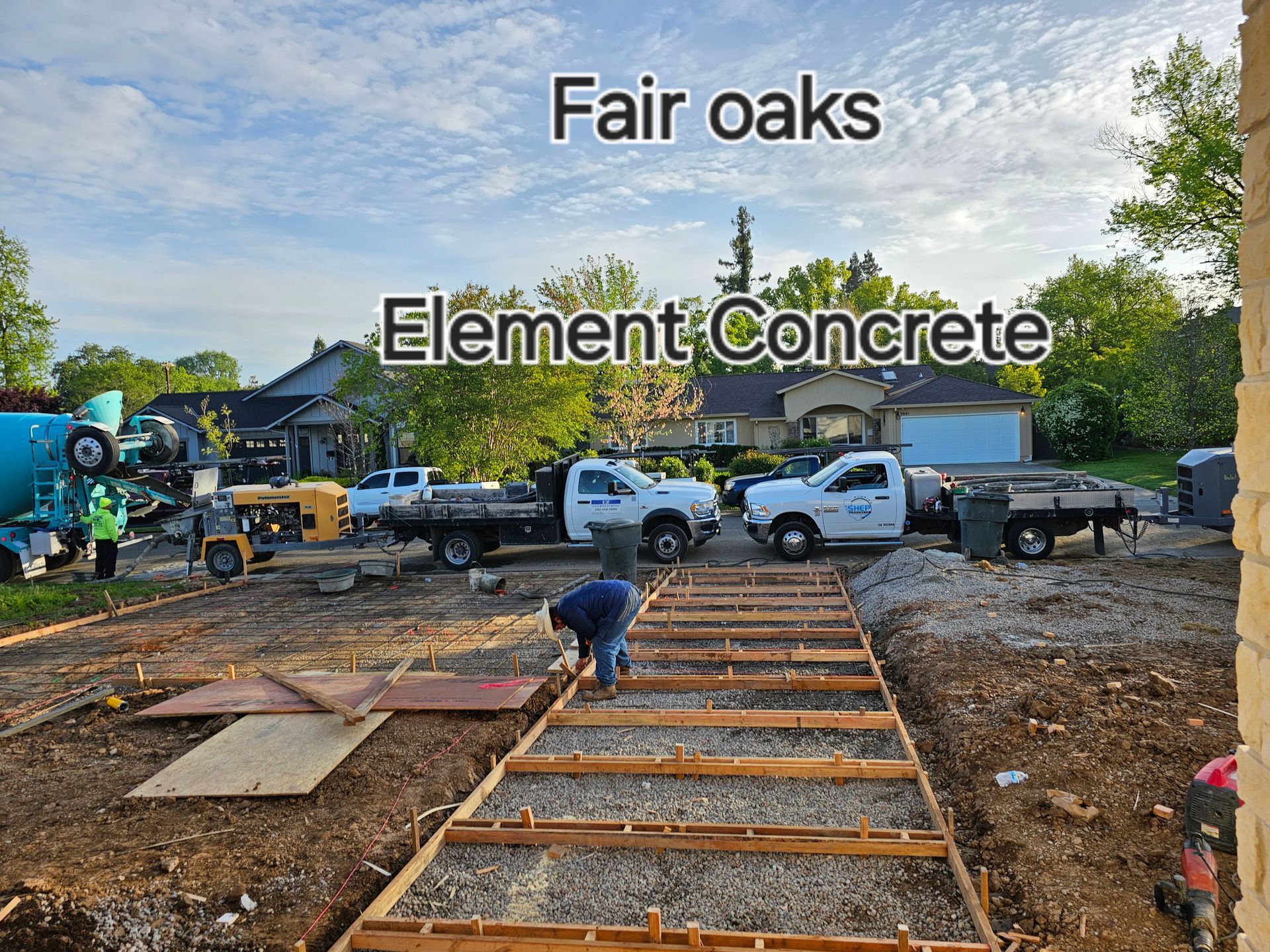 A concrete driveway is being built with fair oaks element concrete.
