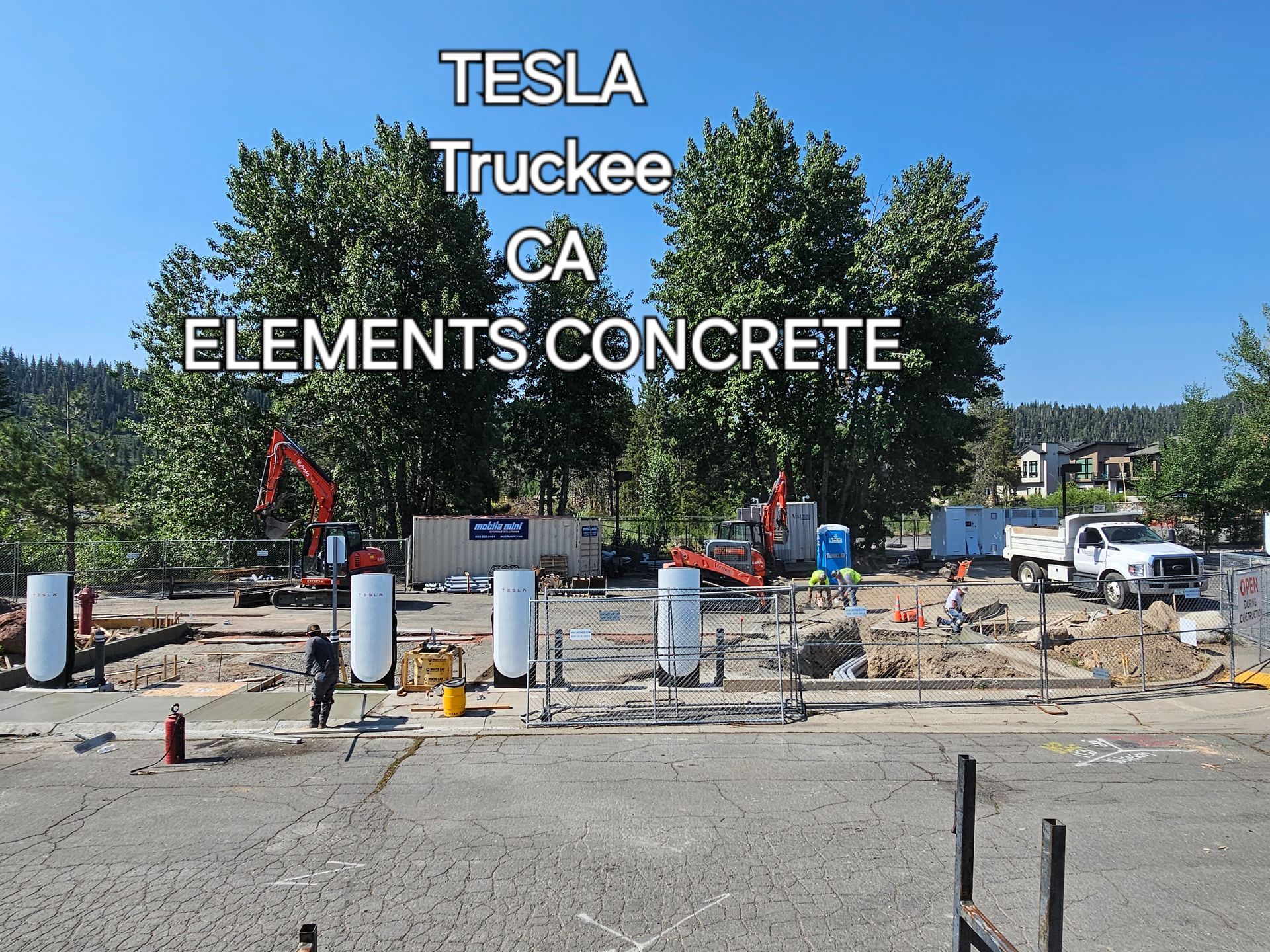 A construction site with tesla truckee ca elements concrete written on it
