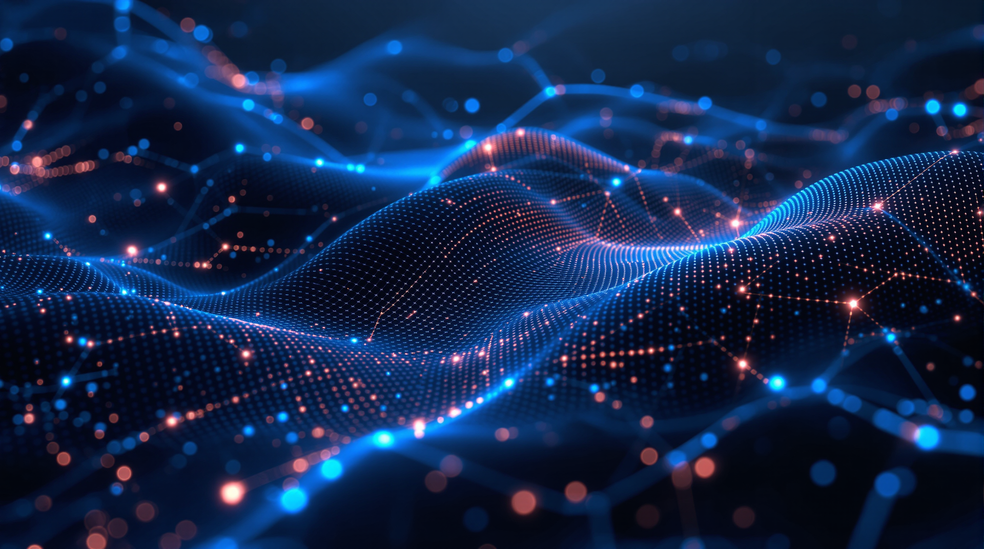 A computer generated image of a wave of particles in the dark.