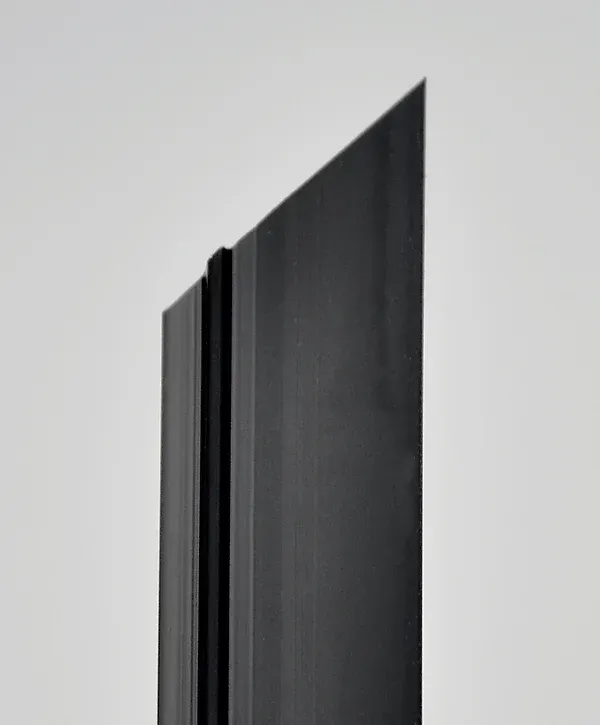 Black, angled metal structure against a white background; a minimalist, architectural detail.