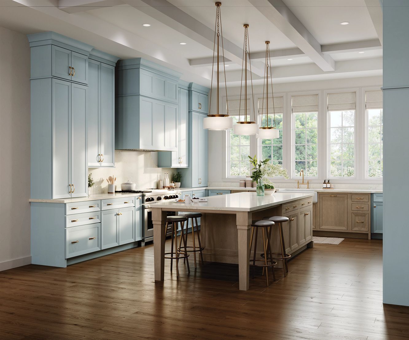 Bright blue kitchen with a large island, pendant lights, and sunlit windows over wood floors