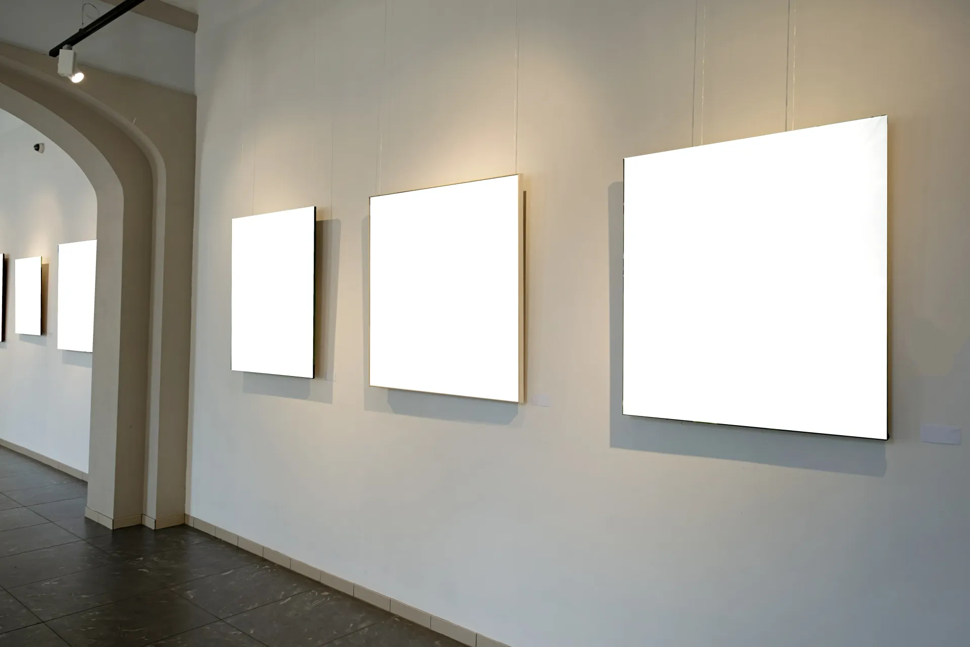 empty frames on gallery wall